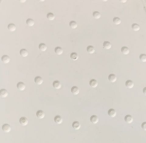 Semelle en matière plastique conductrice, grise, avec profil à picots
